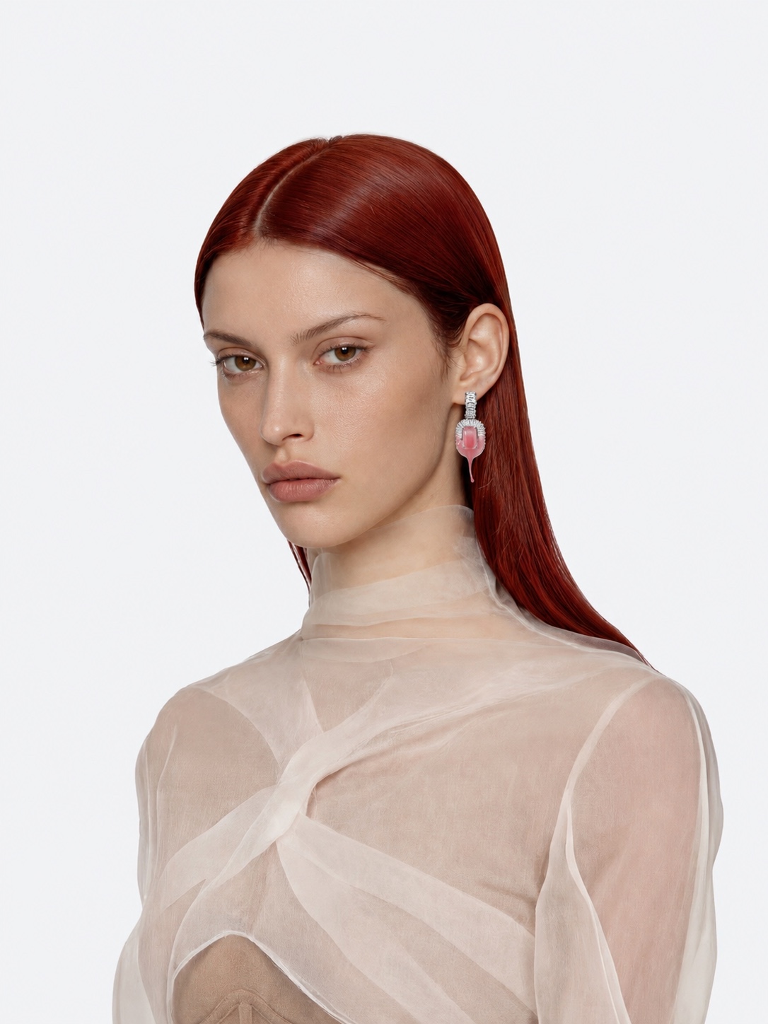Model wearing ARYUTKINA pink earrings